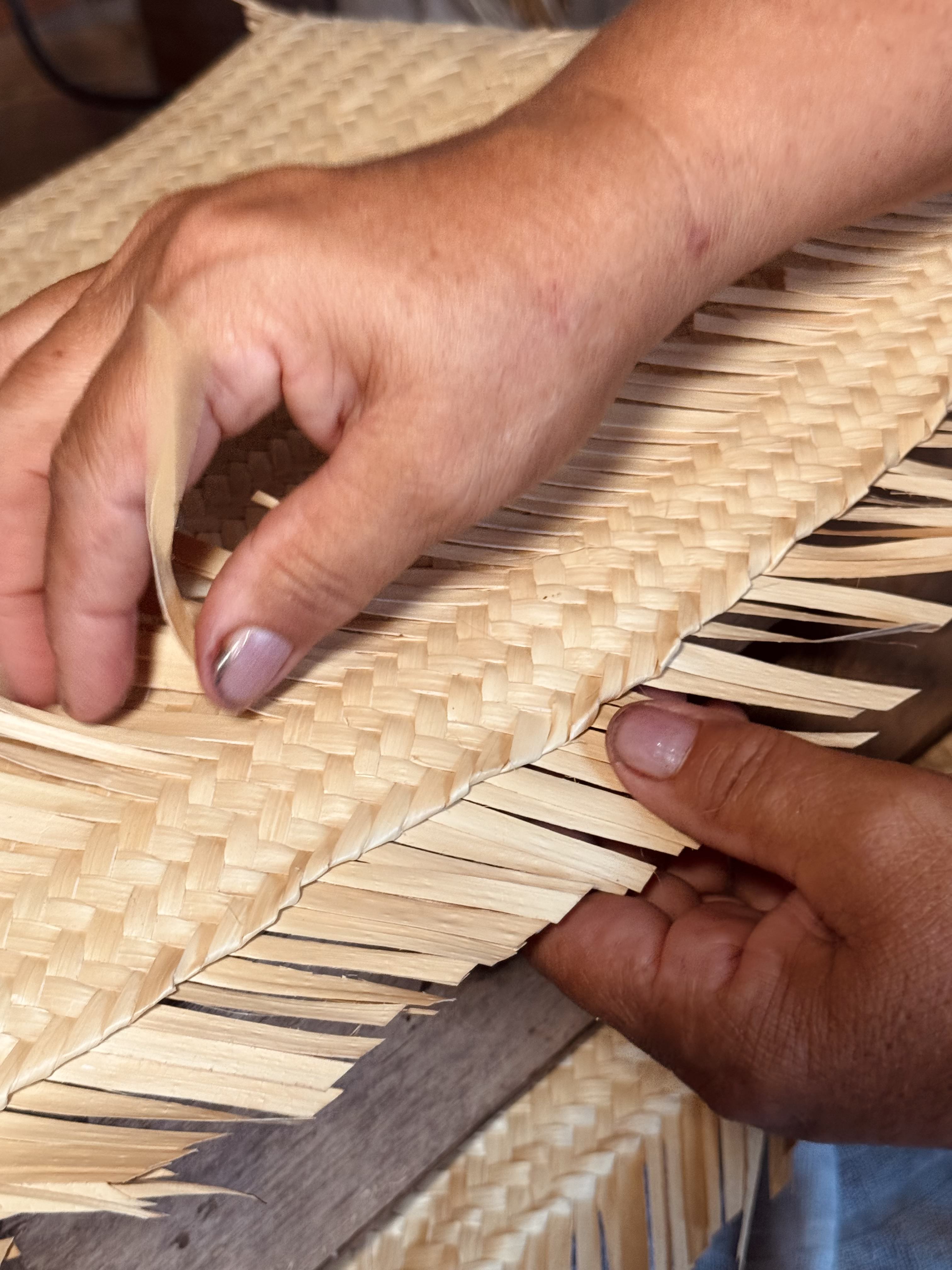 Hands braiding fiber