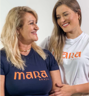 A founder beside her mother
